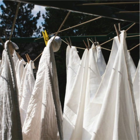 Esenne laundry ritual on outdoor clothesline